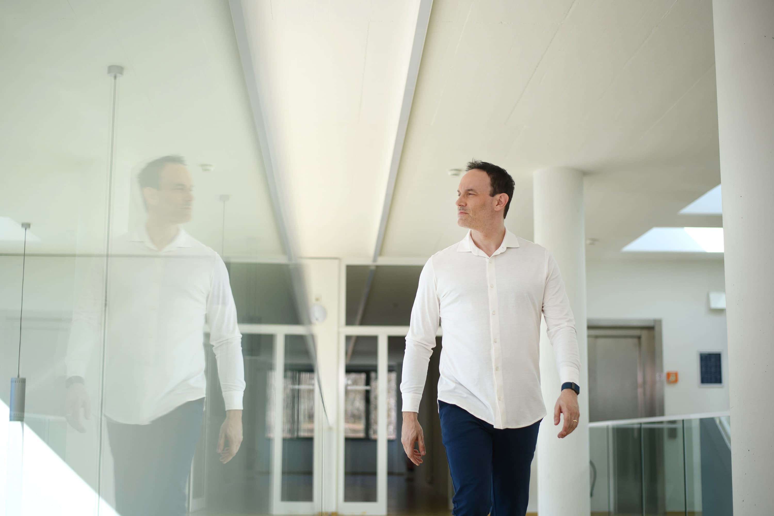 Michael Backes on an upper gallery inside the CISPA research centre building